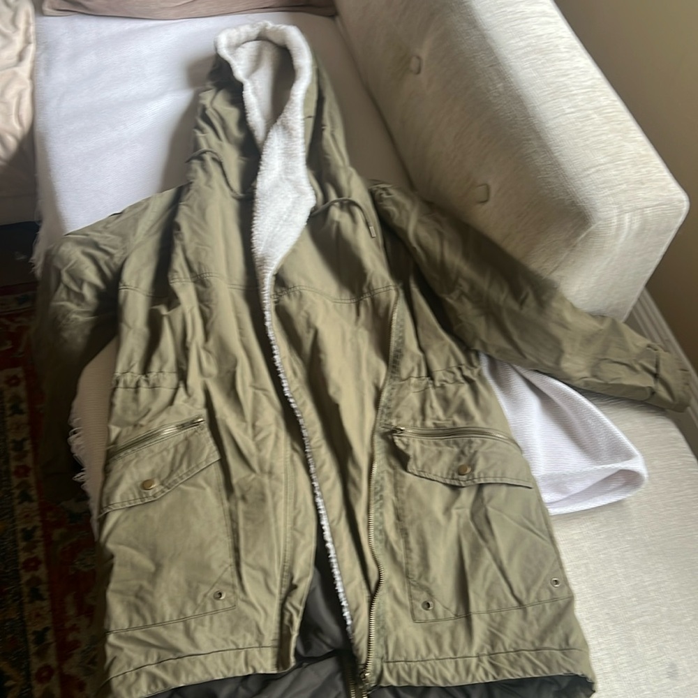 A very nice jacket with hoody, pretty warm. In a very good condition. Size s